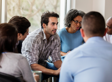 People sitting down in a discussion
